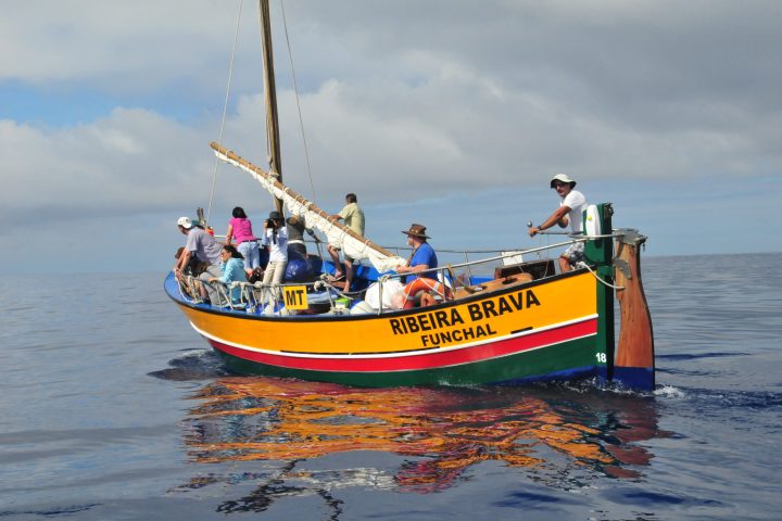 a small boat in a body of water