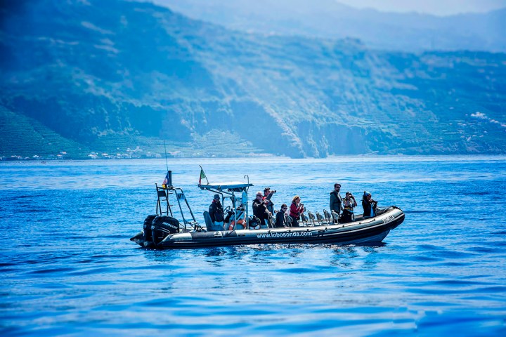 a small boat in a body of water
