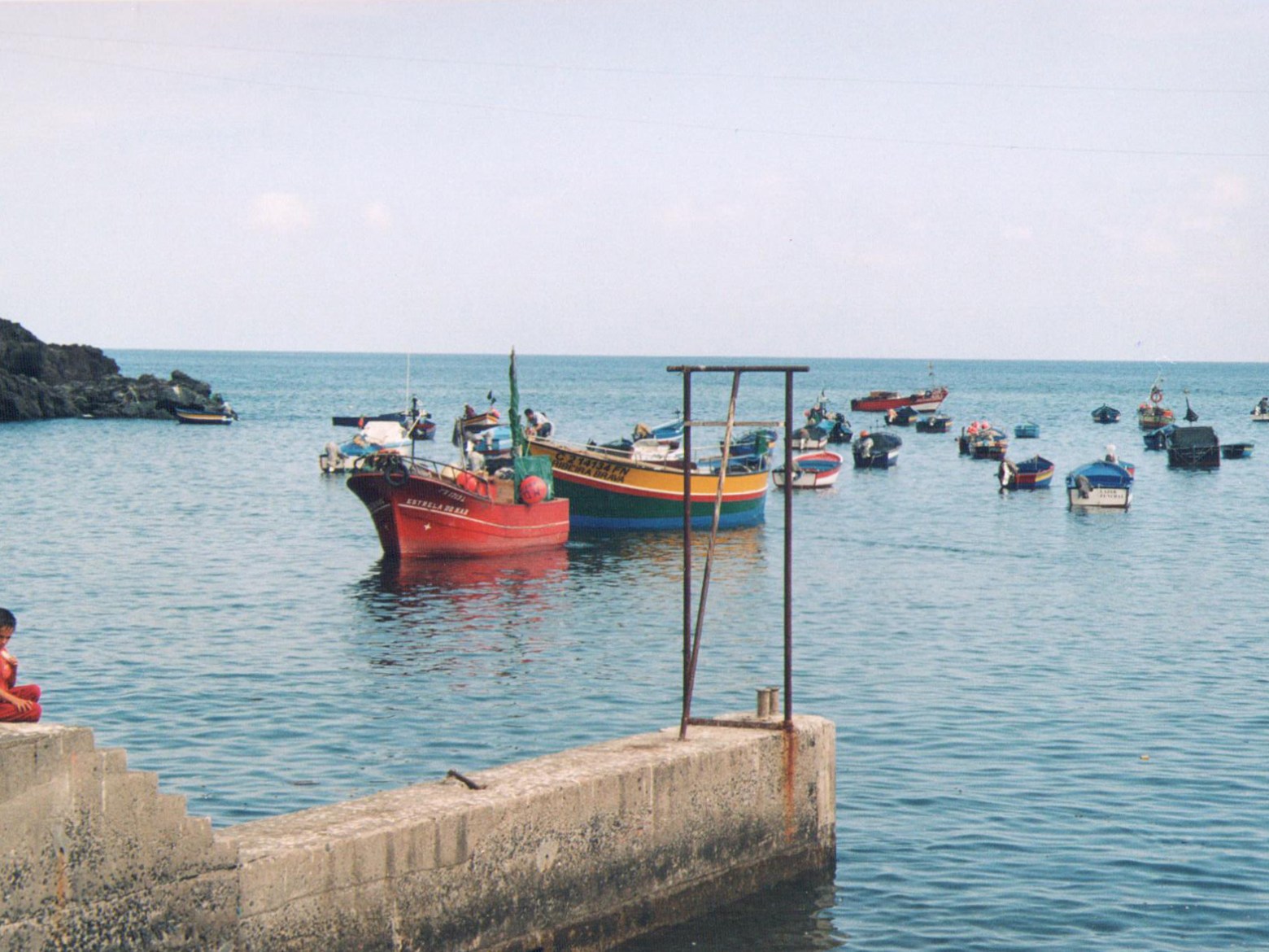 a small boat in a body of water
