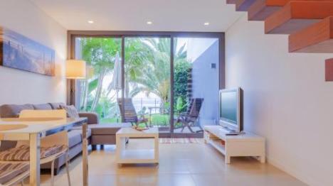 a room filled with furniture and a wood floor