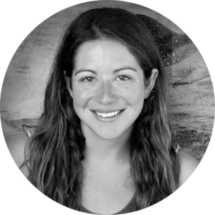 a person standing in front of a mirror posing for the camera